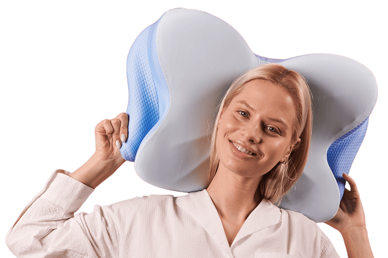 Woman smiling while holding the butterfly-shaped contour pillow up beside her head, plain white background